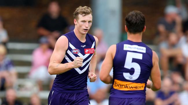 Josh Treacy of the Dockers celebrates his goal. Picture: James Worsfold