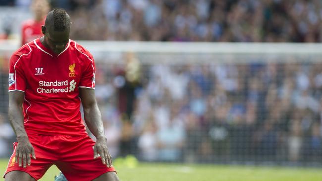 Liverpool's Mario Balotelli reacts after missing a chance on his Reds debut.