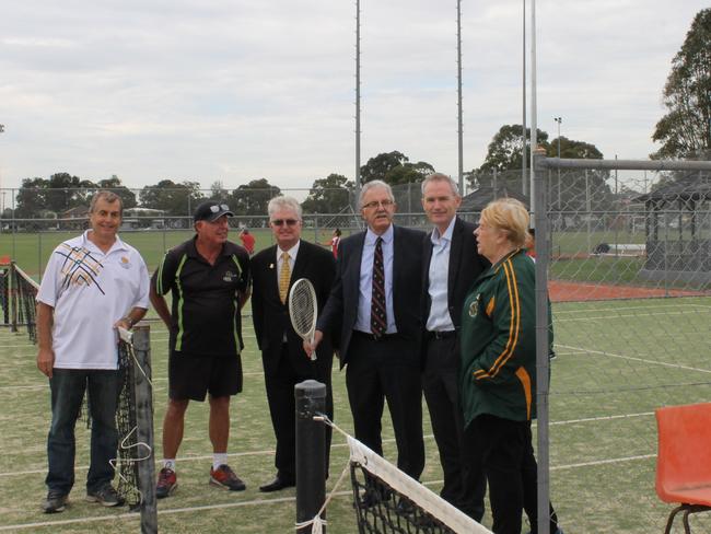 Banks federal Liberal MP David Coleman with Canterbury-Bankstown Tennis Association officials at Marco Avenue in Panania. The association has received a $360,000 federal grant to build two new multipurpose courts.