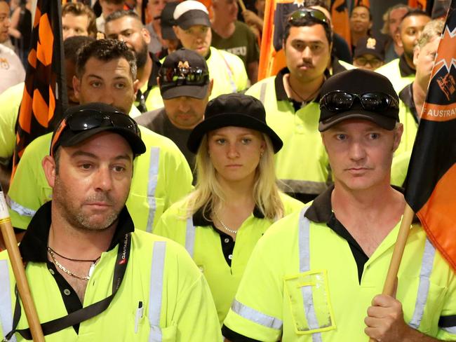 Jetstar baggage and ramp workers walk off the job and march through Sydney's domestic Airport. 19th December, 2019. Picture by Damian Shaw