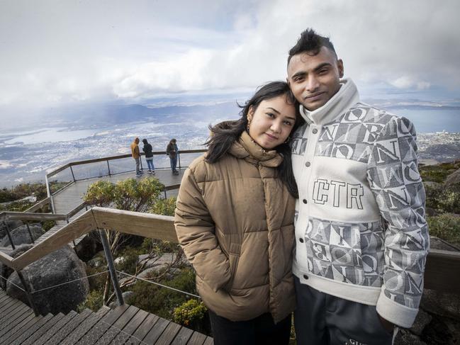 Aditi Shahi and Shyam Maharjan of Sydney at the kunanyi/ Mount Wellington summit. Picture: Chris Kidd