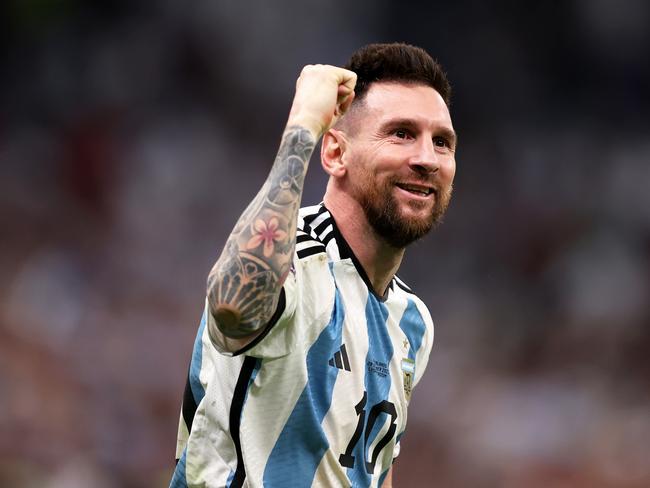 LUSAIL CITY, QATAR - DECEMBER 09: Lionel Messi of Argentina celebrates after the win in the penalty shootout during the FIFA World Cup Qatar 2022 quarter final match between Netherlands and Argentina at Lusail Stadium on December 09, 2022 in Lusail City, Qatar. (Photo by Julian Finney/Getty Images)