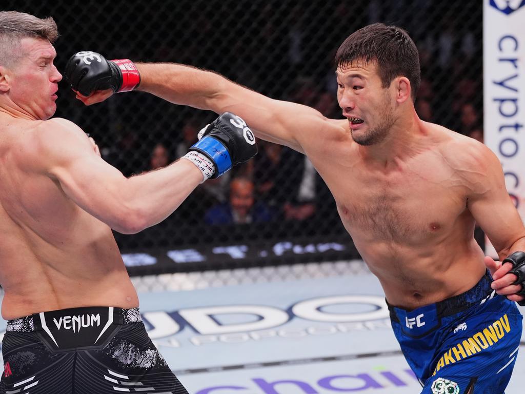 Rakhmonov punches Stephen Thompson in a welterweight fight during UFC 296. Picture: Jeff Bottari/Zuffa LLC via Getty Images