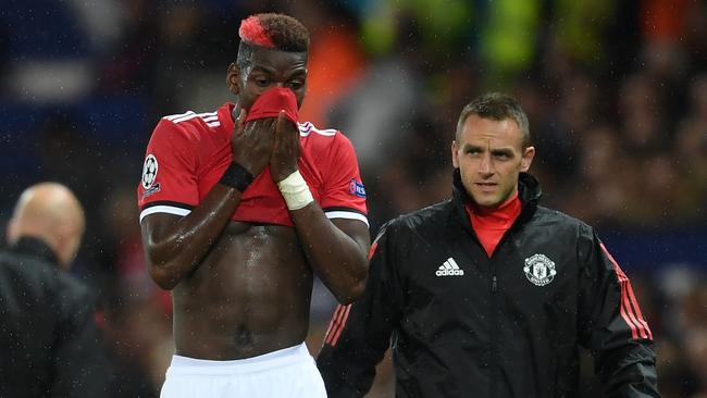 Paul Pogba of Manchester United goes off through injury.