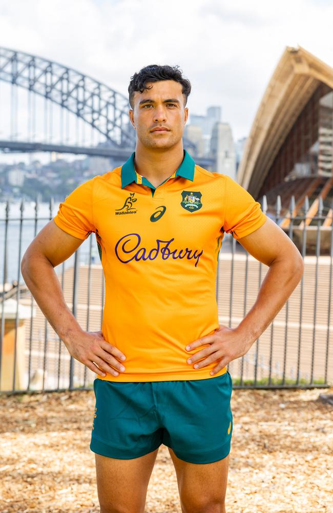 Joseph-Aukuso Suaalii in his Wallabies kit, in front of Sydney tourist icons, the Opera House and Harbour Bridge.