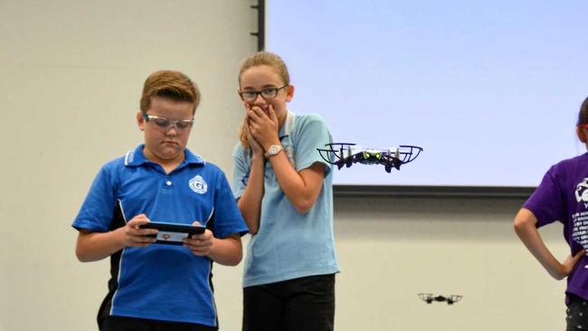 HANDS-ON: Gayndah State School students learn how to fly drones as SheMaps visits the region. Picture: Felicity Ripper