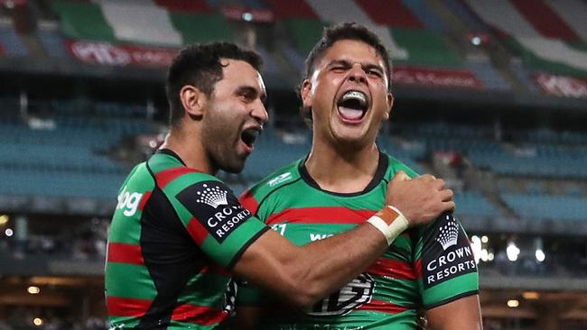 SYDNEY, AUSTRALIA - MARCH 25: Latrell Mitchell of the Rabbitohs celebrates with Alex Johnston of the Rabbitohs after scoring a try during the round three NRL match between the South Sydney Rabbitohs and the Sydney Roosters at Accor Stadium, on March 25, 2022, in Sydney, Australia. (Photo by Matt King/Getty Images)