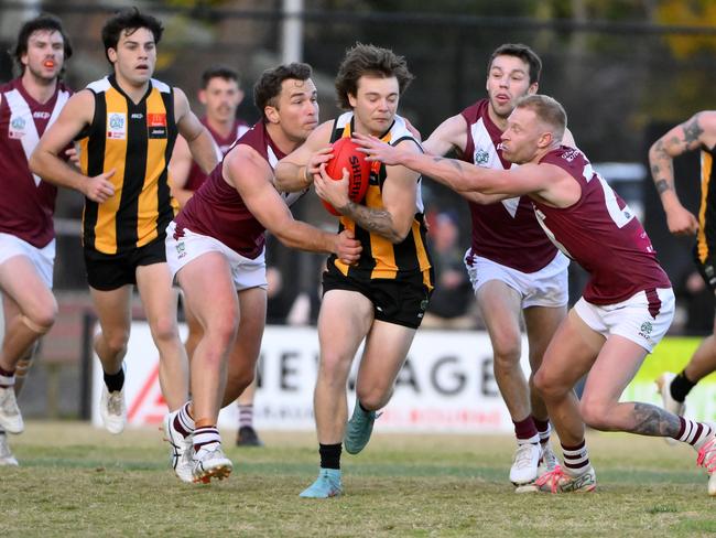 OEFN Senior Football. Premier Data Premier Division Seniors, Round 7. Upwey Tecoma Seniors vs Mt Evelyn Seniors, played at Upwey Tecoma Football Club, Chosen Avenue, Upwey, Victoria, Saturday 24th May 2025. Upwey Tecoma Seniors player Blake Burrows gets tackled by Jason Want . Picture: Andrew Batsch