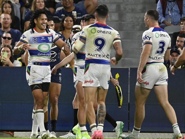 Dallin Watene-Zelezniak of the Warriors celebrates after scoring a try. Picture: Ian Hitchcock/Getty Images