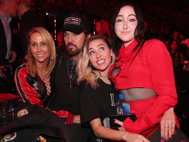 Noah Cyrus (pictured right) reportedly fell out with mum Tish and sister Miley. Picture: Christopher Polk/Getty Images for iHeartMedia