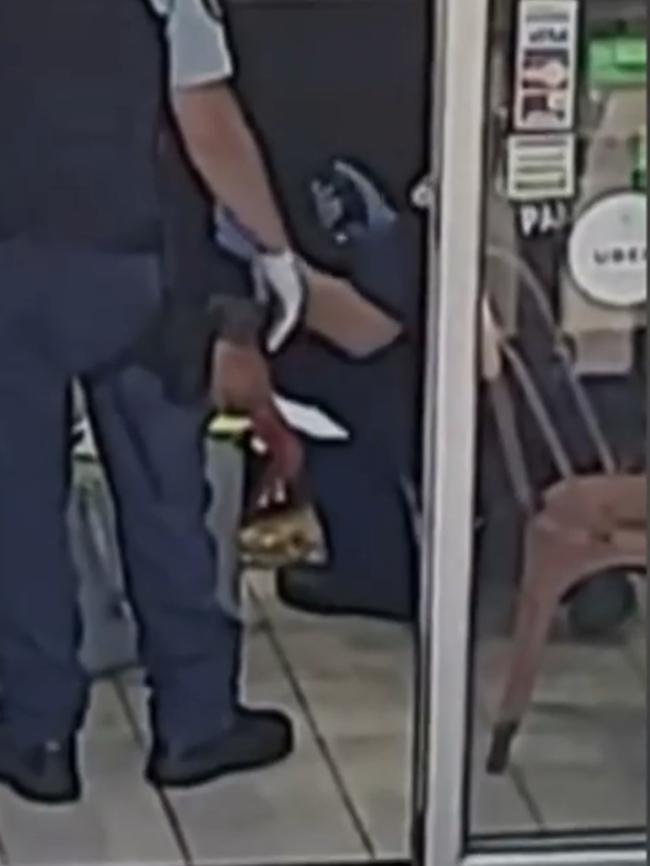 Police tending to the male victim following an alleged stabbing at a Mt Druitt kebab shop on Friday morning. Picture: Supplied / Channel 9