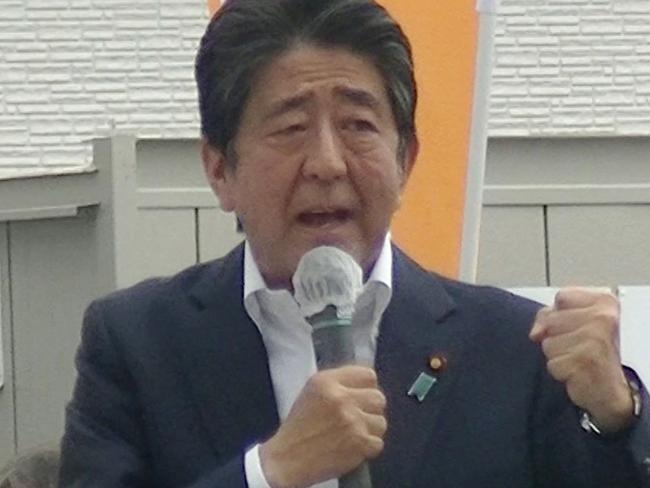 This image taken from video provided by witness Toshiharu Otani and released via Jiji Press shows former Japanese prime minister Shinzo Abe delivering an election campaign speech at Kintetsu Yamato-Saidaiji station square in Nara before he was shot. - Japan's former prime minister Shinzo Abe has been confirmed dead after he was shot at a campaign event in the city of Nara on July 8, 2022, public broadcaster NHK and Jiji news agency reported. (Photo by Handout and Toshiharu Otani / JIJI PRESS / AFP) / - Japan OUT / -----EDITORS NOTE --- RESTRICTED TO EDITORIAL USE - MANDATORY CREDIT 