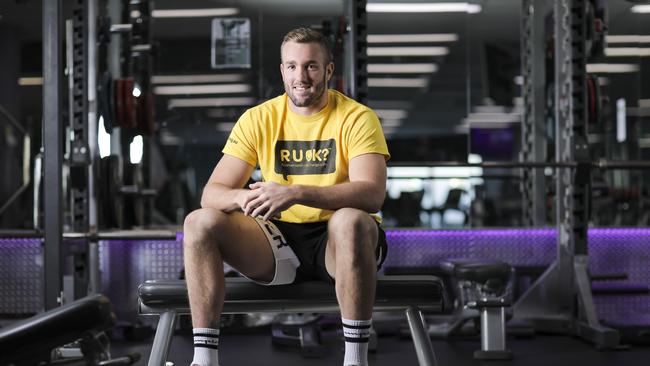 Wallabies lock Izack Rodda visited Anytime Fitness at Bowen Hills to back the Tread As One treadmill challenge to support the suicide prevention message of the charity RU OK? Picture: Mark Cranitch