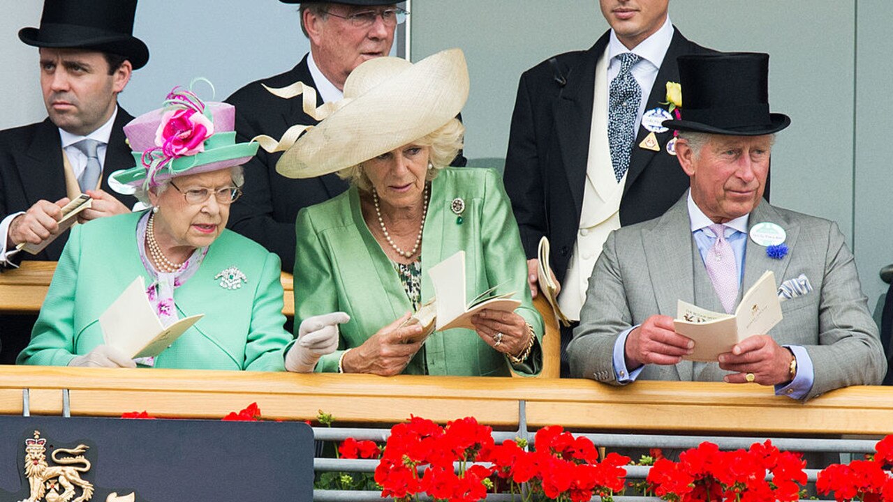 ASCOT, UNITED KINGDOM - JUNE 19:  Queen Elizabeth II, Camilla, Duchess of Cornwall and Prince Charles, Prince of Wales attend day 2 of Royal Ascot at Ascot Racecourse on June 19, 2013 in Ascot, England. (Photo by Samir Hussein/WireImage)