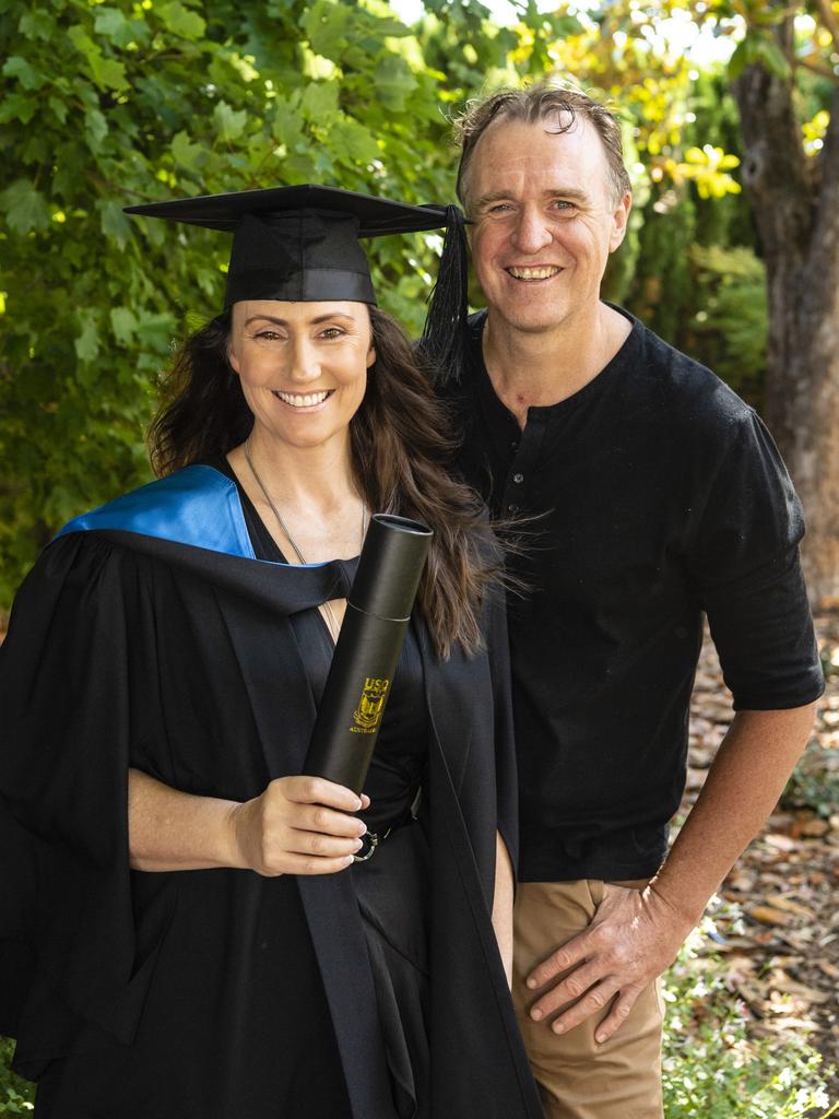 Bachelor of Sport and Exercise Science (Honours) graduate Nicole Doolan with Tomas Hamilton at the UniSQ graduation ceremony at Empire Theatres, Wednesday, December 14, 2022.