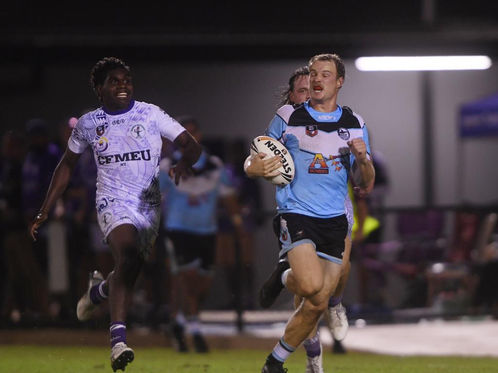 Sharks' Lachie Wright is chased down by Darwin Brothers’ Antonio James in the Humpty Dumpty Foundation round of 2022 NRLNT season. Picture: (A)manda Parkinson