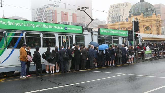 Congestion at tram stop near Flinders St Station.