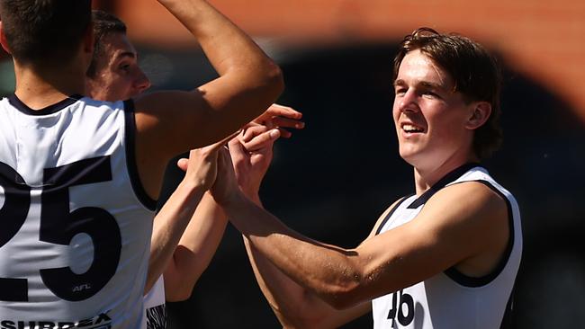 MELBOURNE, AUSTRALIA - SEPTEMBER 17: William McLachlan of the Geelong Falcons (R) celebrates kicking a goal during the Coates Talent League Boys Preliminary Final match between Sandringham Dragons and Geelong Falcons at Queen Elizabeth Oval on September 17, 2023 in Melbourne, Australia. (Photo by Graham Denholm/AFL Photos via Getty Images)