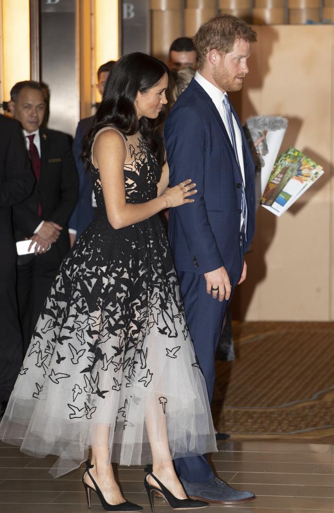 Meghan and Harry showed off some low-key PDA in Sydney last night. Picture: Getty Images