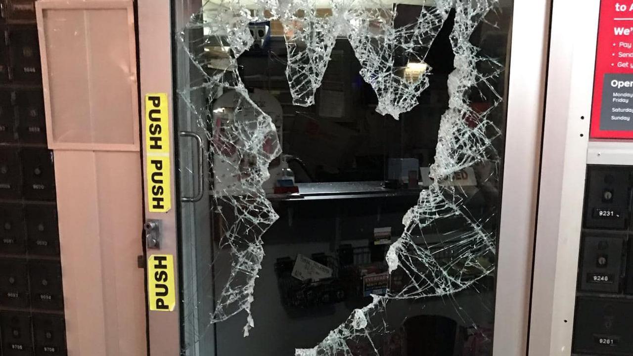 Smashed door at Park Avenue Post Office from February 20, 2022.