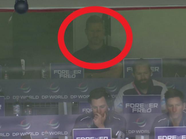 Nathan Buckley in Fremantle's coach's box.