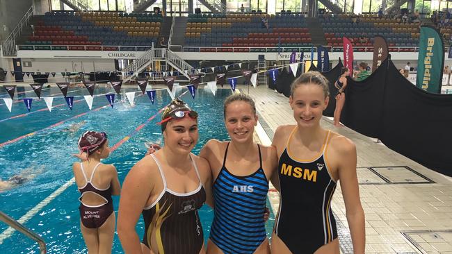 All Hallows' School swimmer Elizabeth Dekkers flanked by fellow podium finishers at the CaSSSA swimming carnival.