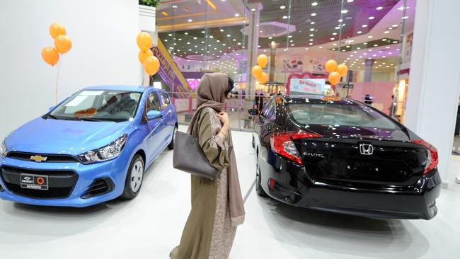 A Saudi woman tours a car show for women on January 11, 2018, in Jeddah. Picture: AFP