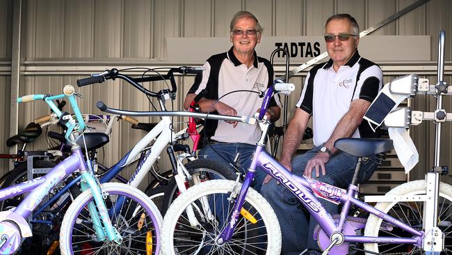 Pride of Australia. Paul Duncombe 68 of Sandy Bay, left, and Barry Wilson 70 of Lauderdale are two retired professionals who customise standard bikes to give independence to children with disabilities