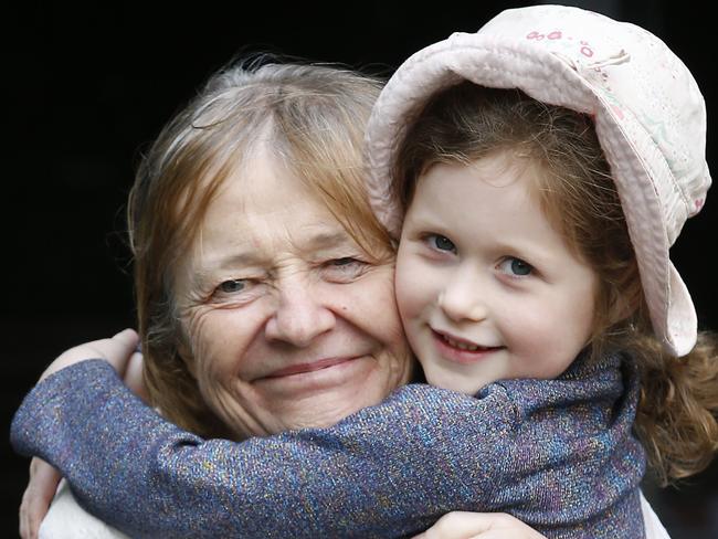 Story is for Future Victoria campaign. Children from kinder Gowrie Victoria in Carlton North at Australian Unity Rathdowne Place Aged Care. Kinder children play with elderly residents in weekly sessions that boost learning and engagement between young and old. Veronica Barr 72, gets a hug from Anouk 5, while potting some plants as part of the intergenerational play sessions.  Picture: David Caird