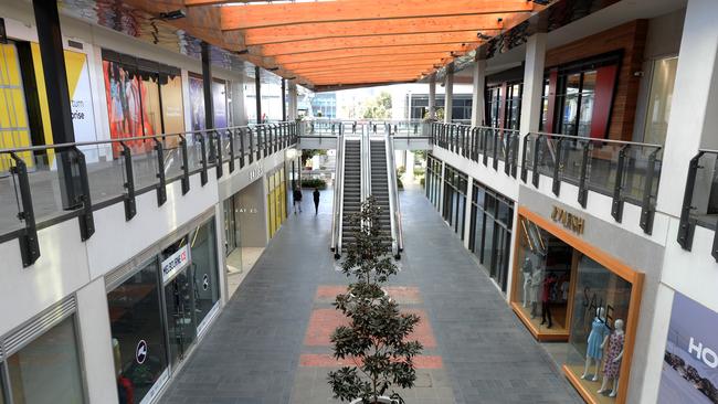 The District Docklands shopping precinct is deserted as COVID-19 restrictions have forced retail areas to close. Picture: NCA NewsWire / Andrew Henshaw