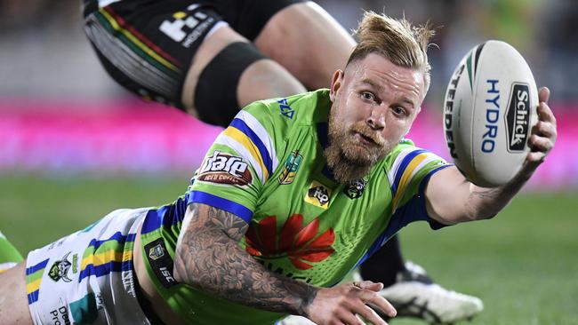 Blake Austin of the Raiders off loads the ball during the round 15 NRL match between the Penrith Panthers and the Canberra Raiders at Carrington Park in Bathurst, Saturday, June 10, 2017. (AAP Image/Dean Lewins) NO ARCHIVING, EDITORIAL USE ONLY