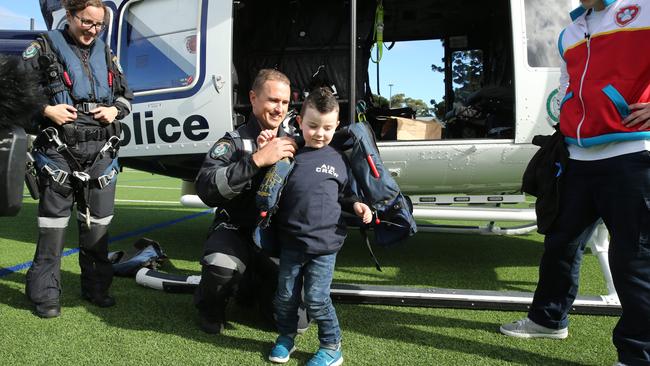 He was made an honorary police aircrew member for the day. Picture: Tim Hunter