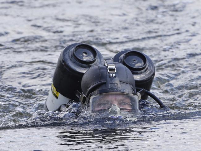 Police divers found parts of Mr Bernard’s body in the Maribyrnong River. Picture: Hamish Blair