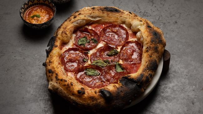 The diavola pizza with crust dipping sauce. Picture: David Kelly