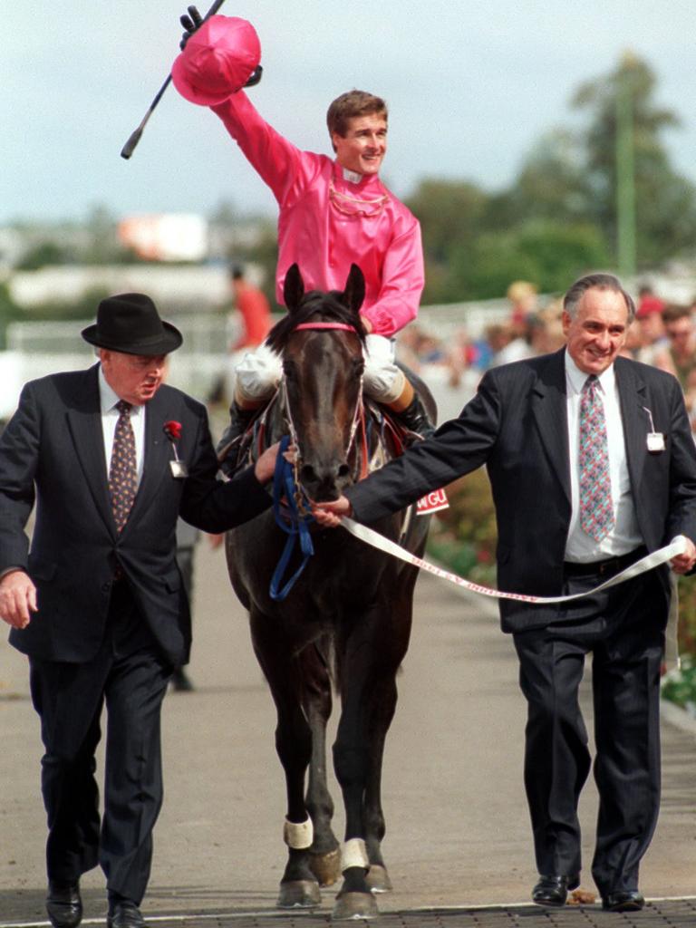 23/03/1996. Racehorse Octagonal led back to scale by owners Jack and Bob Ingham after winning Race 5, AAMI Guineas (formerly Rosehill Guineas) at Rosehill, jockey Darren Beadman.