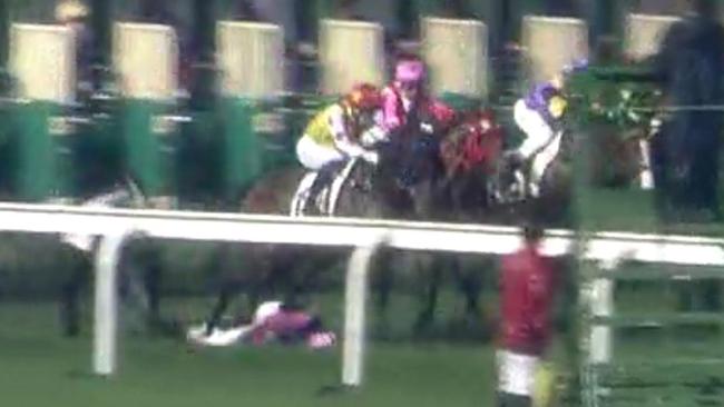 The tragic fall which left Sydney jockey Tye Angland a quadriplegic. Angland came off when Go Beauty Go knuckled over coming out of the barriers in Hong Kong.