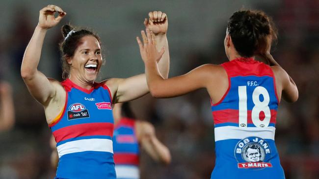 Emma Kearney (left) celebrates with Libby Birch.