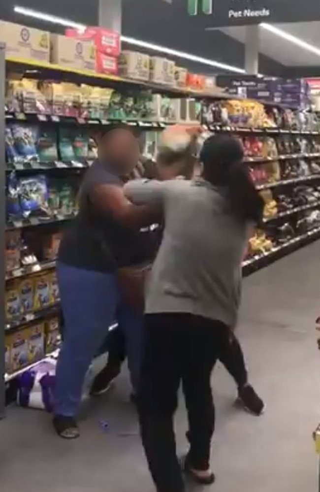 Shoppers fight over toilet rolls in Woolworths Chullora as the coronavirus craziness hits new levels. Picture: Twitter