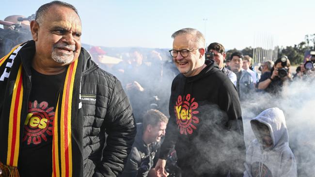 Anthony Albanese joins Michael Long on a Yes march that ended in Canberra. Picture: Martin Ollman