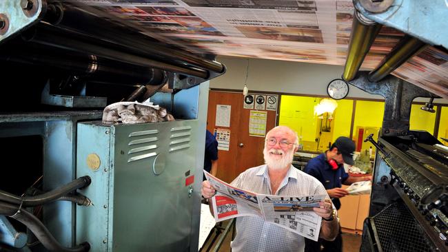 Steve Menzies looks over the last run of the Centralian Advocates printing press. A veteran employee of 26 years Menzies arrived four years before the press was installed. The Advocate will now be published in Darwin.