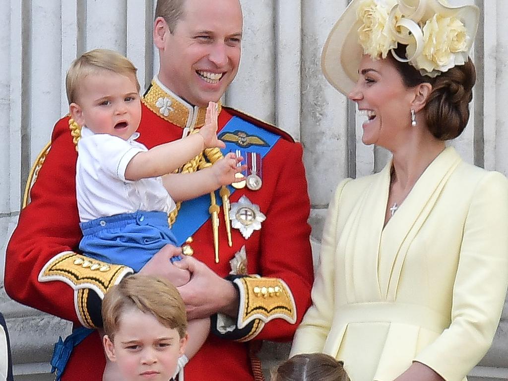 Britain's Prince William, Duke of Cambridge holding Prince Louis, Prince George, Princess Charlotte and Britain's Catherine, Duchess of Cambridge at the Trooping the Colour. Picture: AFP