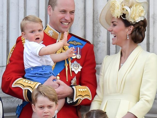 Britain's Prince William, Duke of Cambridge holding Prince Louis, Prince George, Princess Charlotte and Britain's Catherine, Duchess of Cambridge at the Trooping the Colour. Picture: AFP