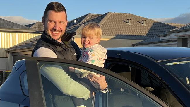 Liam Gayner with his almost two-year-old daughter Isabelle. Mr Gayner says he is now saving more than 50 per cent on his car insurance. Picture: Supplied