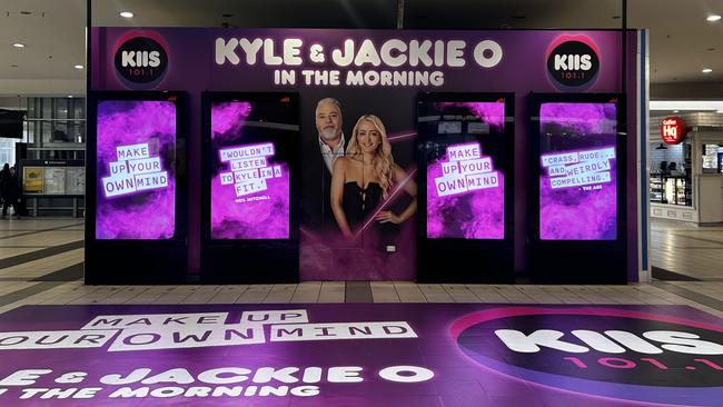 KIIS 101.1FM promoting the Kyle and Jackie O show in Melbourne inside Flinders Street station.