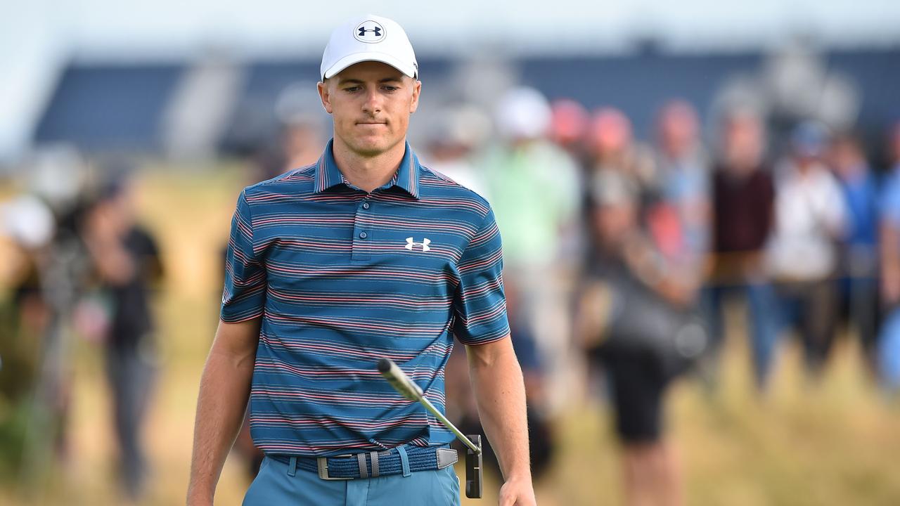 Jordan Spieth tosses his putter after missing a putt in the final round of The Open.