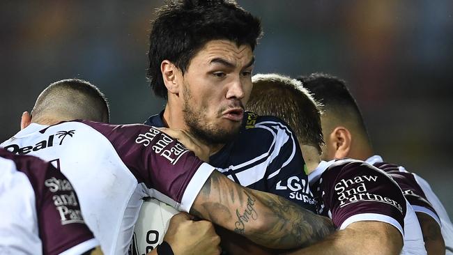 Jordan McLean of the Cowboys runs the ball during the round 13 NRL match between the North Queensland Cowboys and the Manly Sea Eagles at 1300SMILES Stadium on June 08, 2019 in Townsville, Australia. (Photo by Ian Hitchcock/Getty Images)