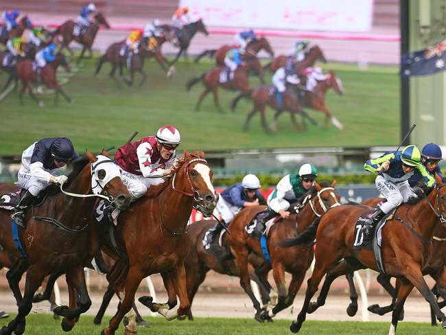 A courageous Palentino edges out Tarzino (left) to win the Group 1 Australian Guineas on the weekend. Picture: Getty Images