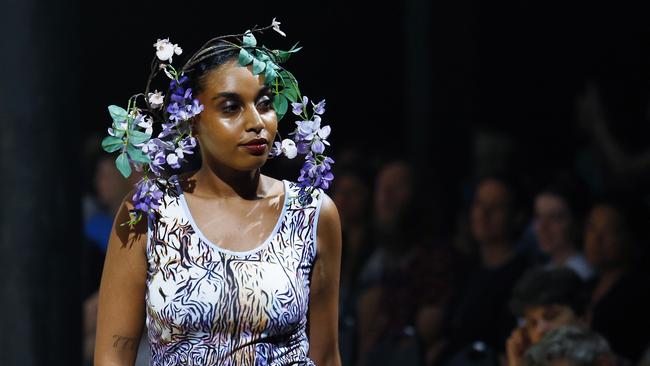 Amariah Savage showcases the Green Love collection from designer Bernard Singleton at the Cairns Indigenous Art Fair fashion performance, Woven, held at the Tanks Arts Centre, Edge Hill. Picture: Brendan Radke