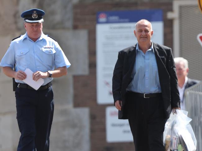 Milton Orkopoulos leaving prison last month. Corrective Services NSW is seeking to have his bail revoked. Picture John Grainger