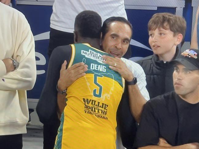 Screengrab of Majok Deng and Eddie Betts hugging after JackJumpers' win in game five of NBL grand final series. Picture: ESPN